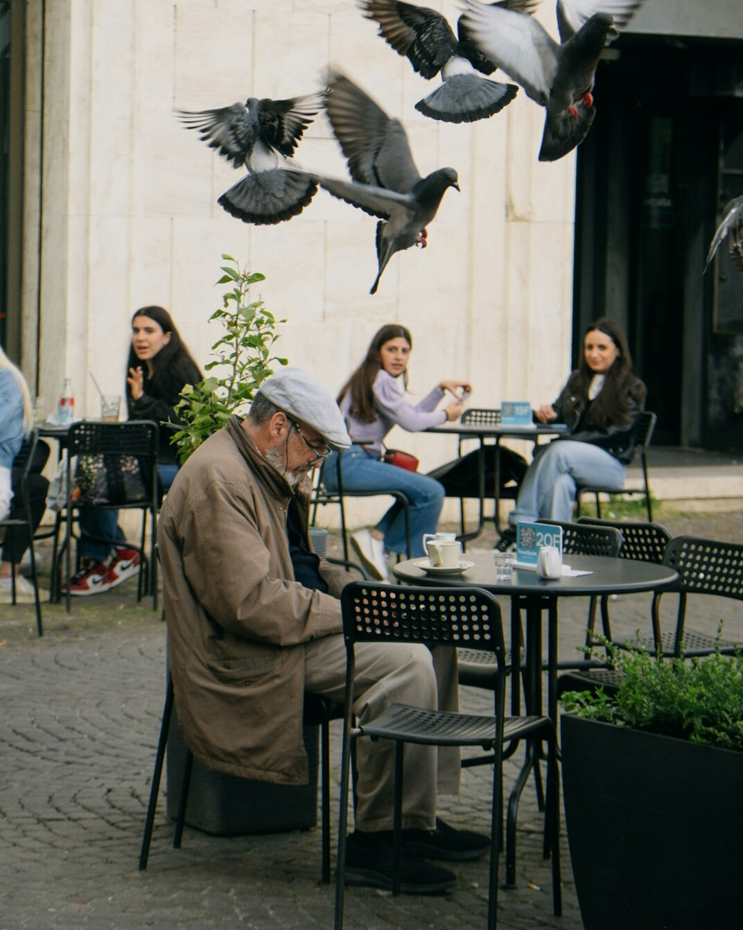 Group of seniors socializing over coffee