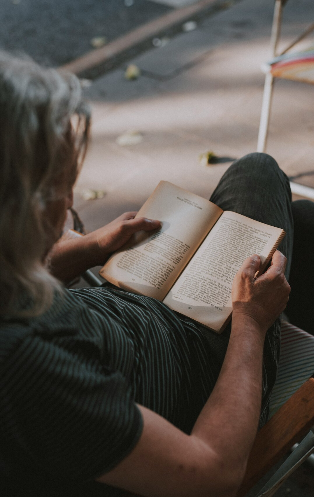 senior woman reading book