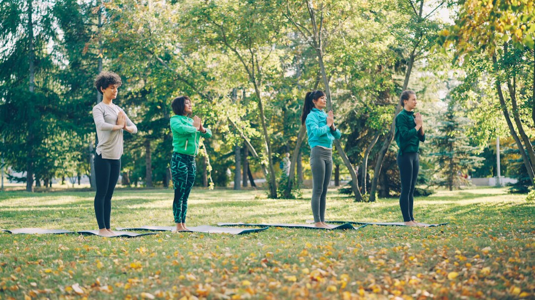 group of seniors doing yoga