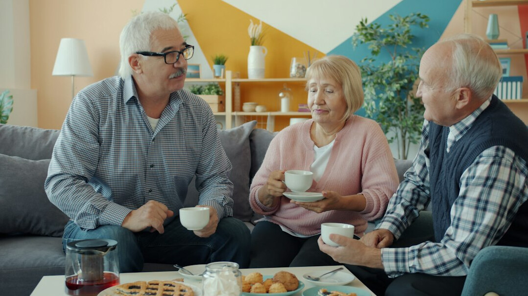 elderly friends chatting