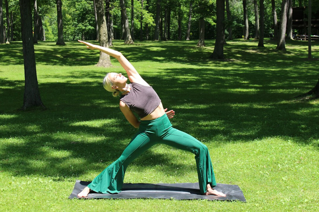 senior doing yoga outdoors